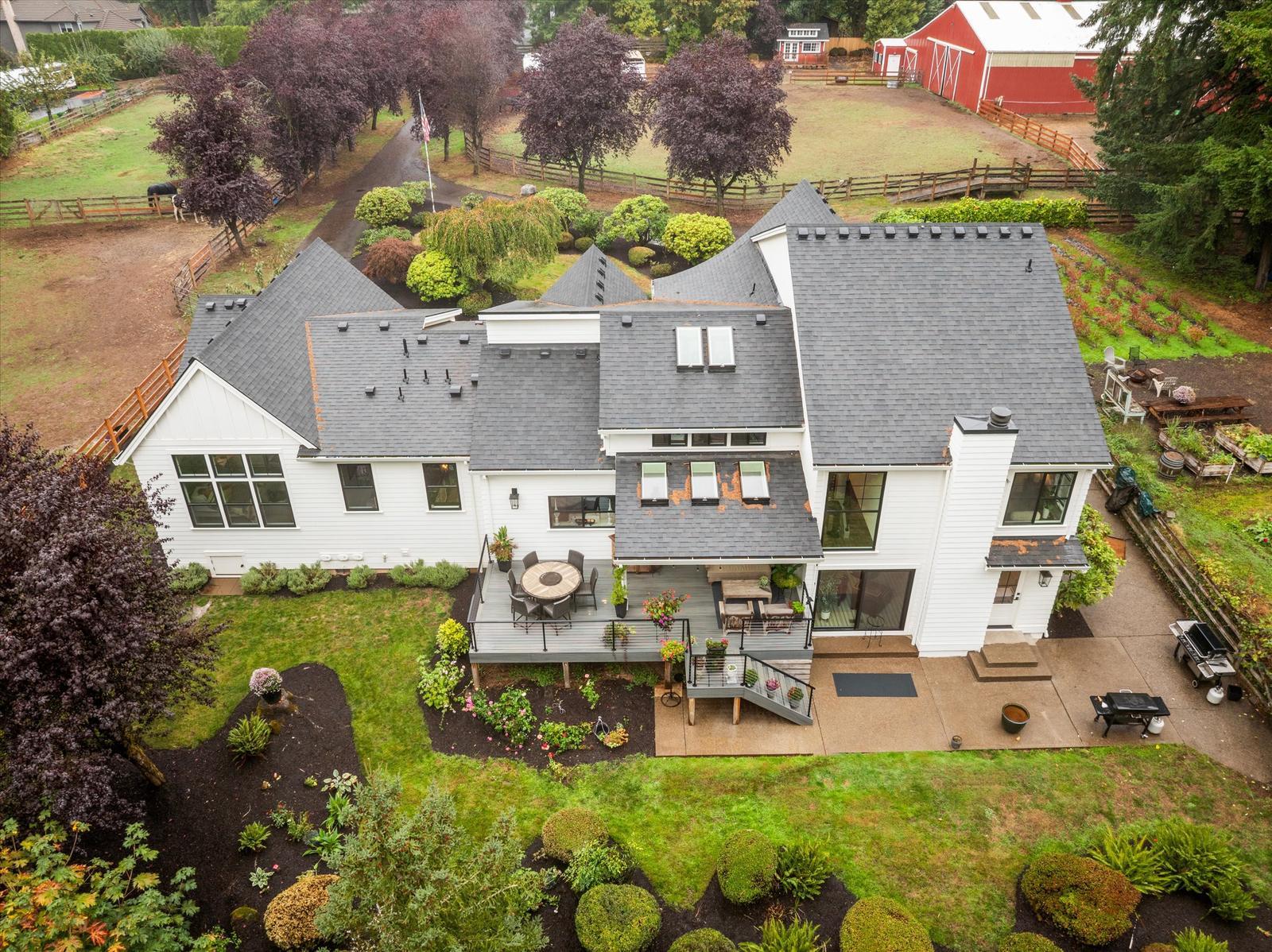 Aerial of the house, deck and gardens